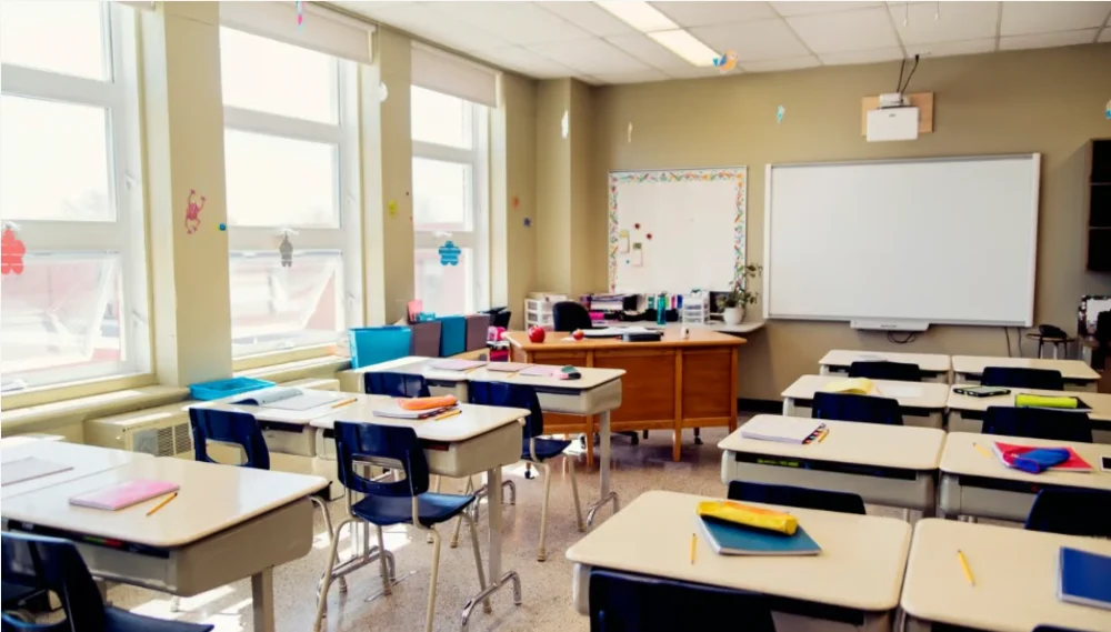 Back to school classroom with desks and chairs promoting good posture for students