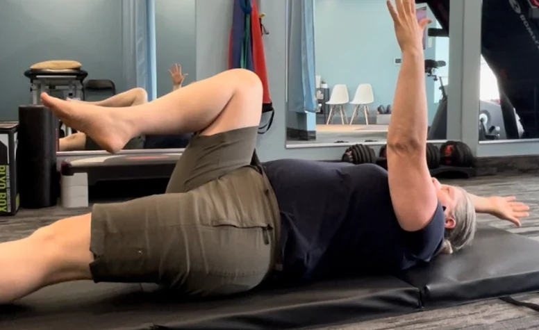 Clinic-guided back and hip mobility drill