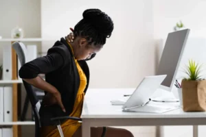 Poor posture and prolonged desk work contributing to TMJ dysfunction in Burlington